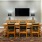 Spacious and well lit clubroom with seating and a library with an upstairs area for private studying.