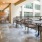 Large outdoor patio with tables for sitting and entertaining.
