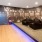 Spacious theatre room with large tv and reclining seats
