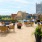 Spacious outdoor patio overlooking the city with plenty of seating and access to the pool 