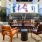 Spacious and well lit clubroom with seating and a library with an upstairs area for private studying.